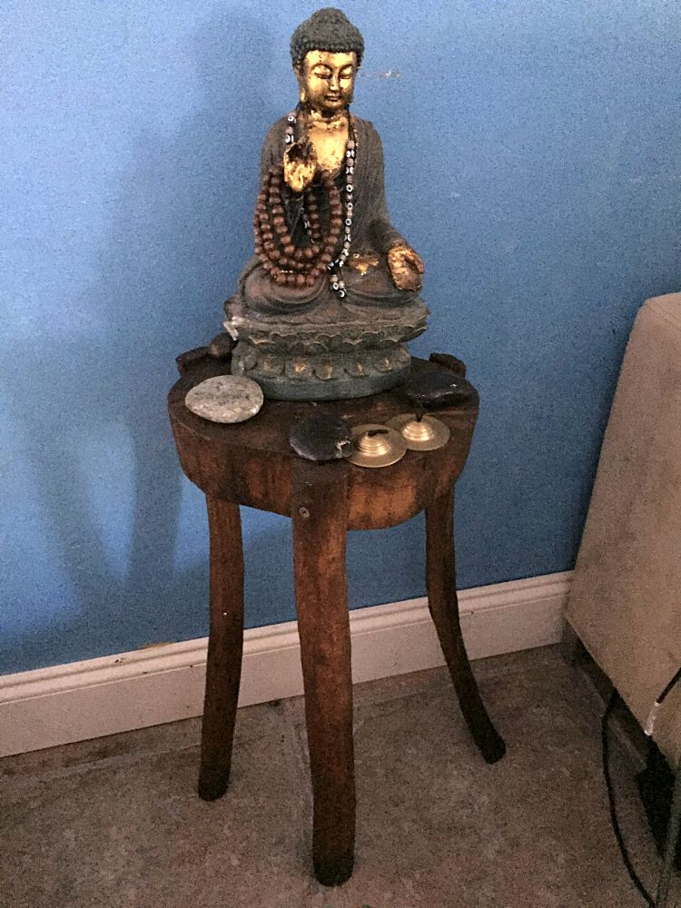 Rustic wood buddha stand